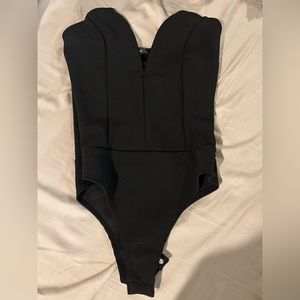 One piece tank top. New never worn!